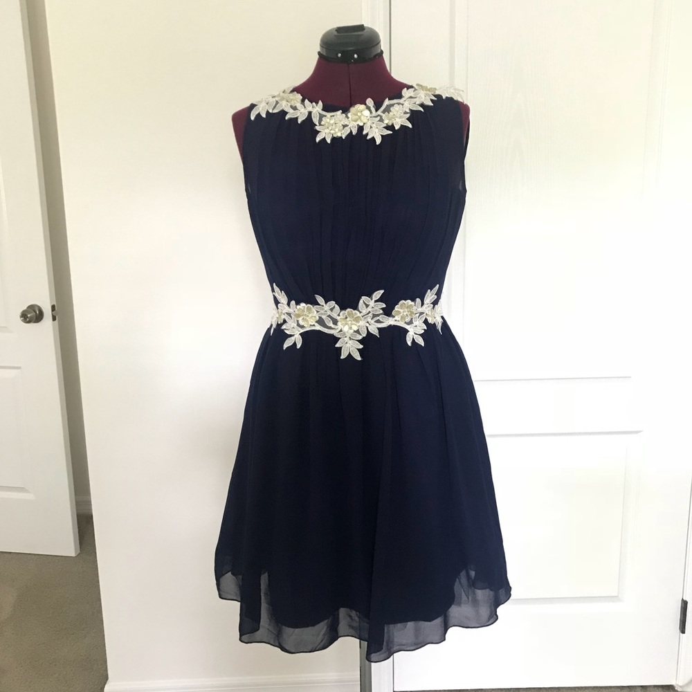 Elegant navy blue and ivory chiffon dress. US 10.